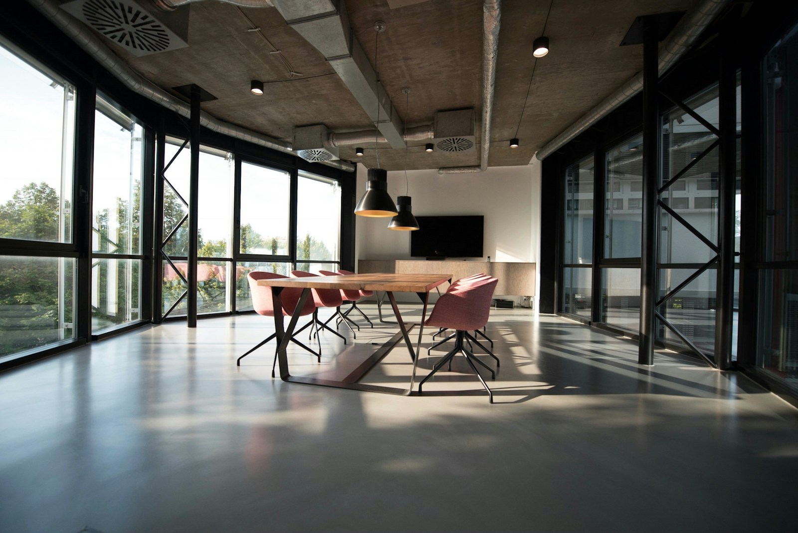 Contemporary workplace with balanced light across desks and circulation paths