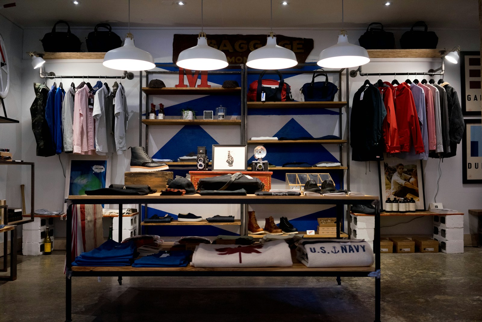 Retail interior with layered lighting around displays and customer circulation